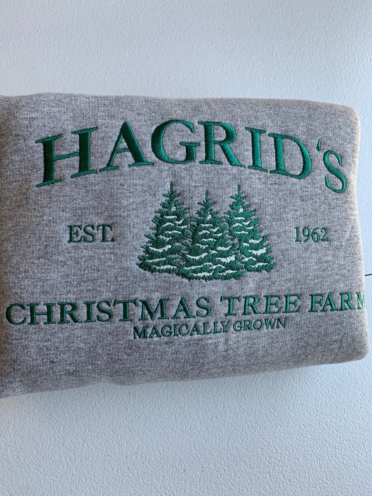 Hagrid's Christmas Tree Farm Embroidered Sweatshirt