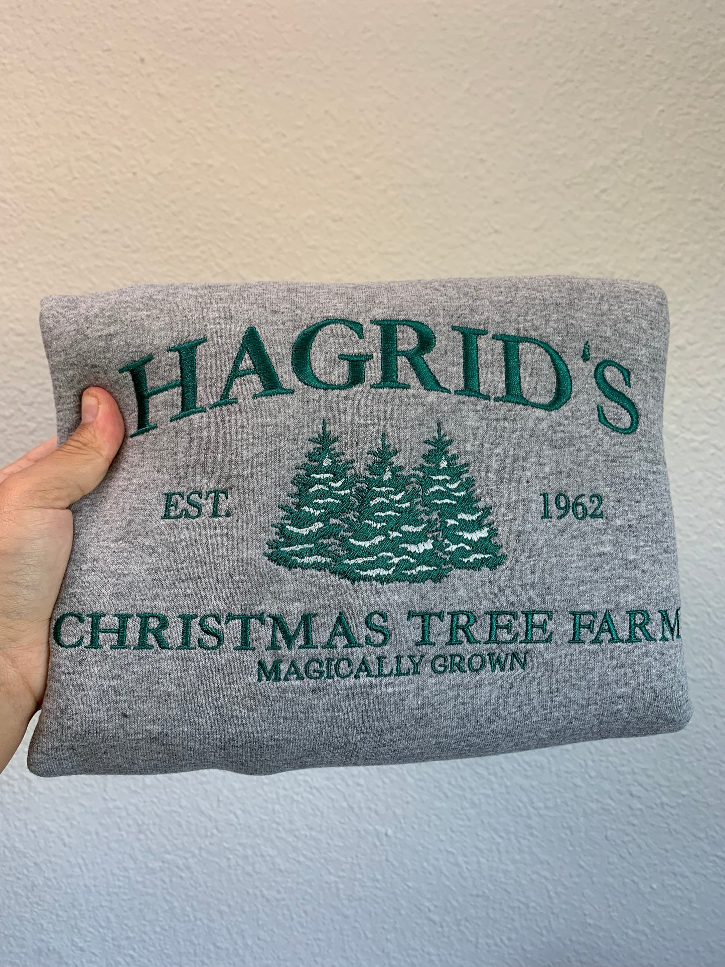 Hagrid's Christmas Tree Farm Embroidered Sweatshirt