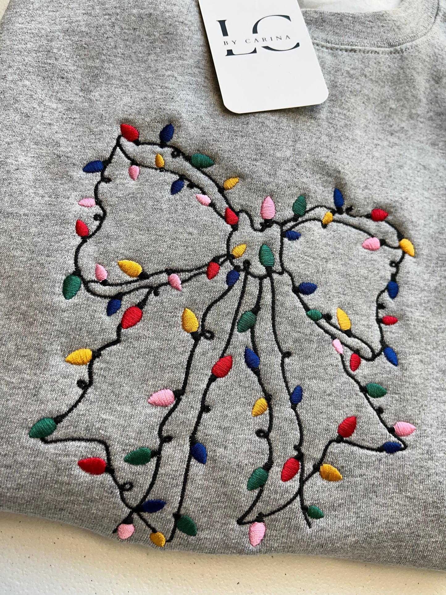 Christmas Lights Bow Embroidered Sweater