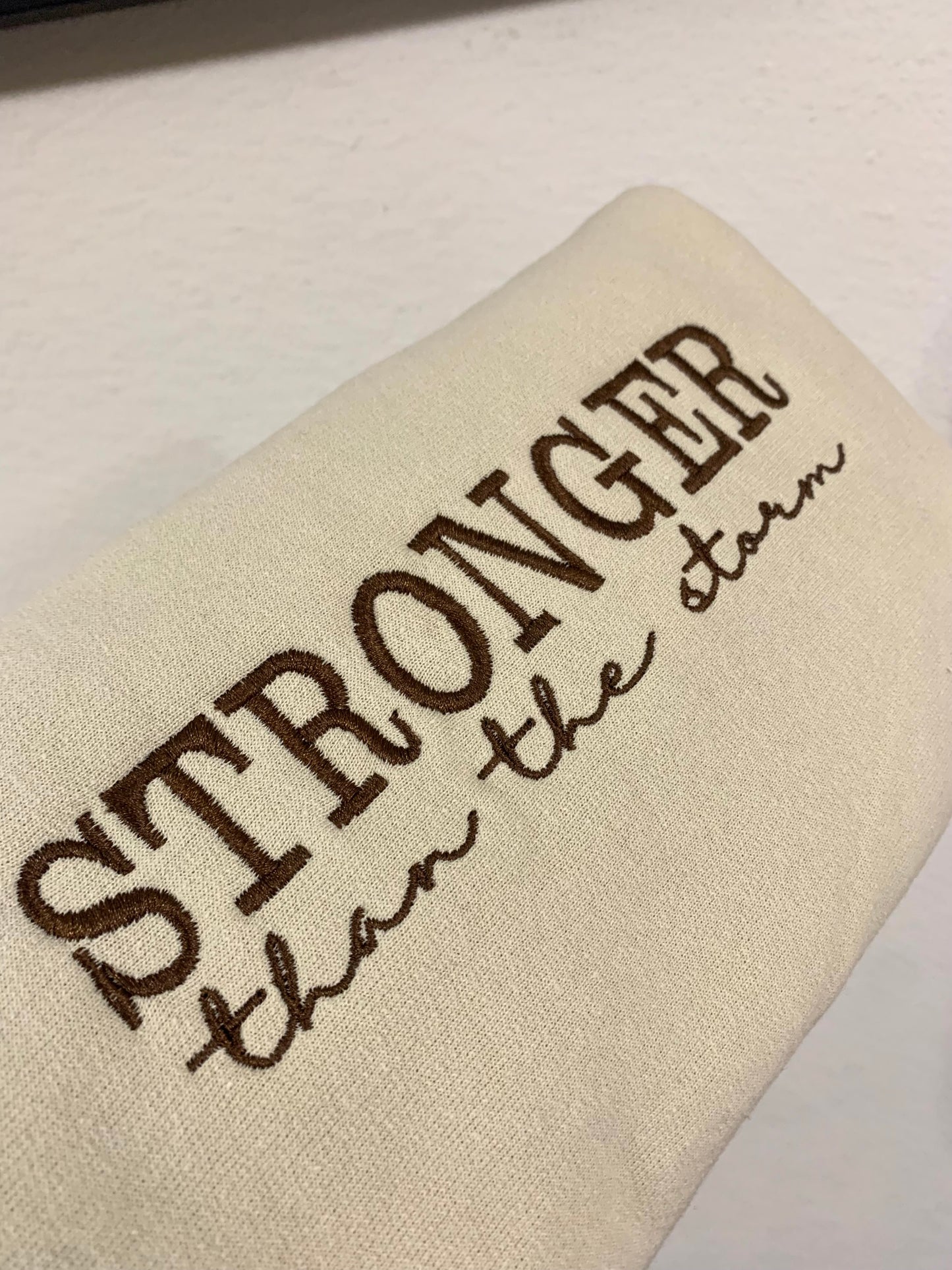 "Stronger than the Storm" Embroidered Sweatshirt